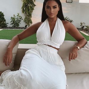 White halter top & maxi skirt set
Fully Lined  100% Rayon Lining 100% Polyester